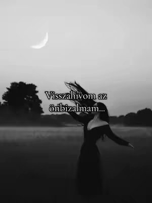 A black and white image shows a woman with long hair, arms outstretched, in a flowing dress, standing in a field with a crescent moon in the sky. Overlay text states, "I call back my self-confidence."
