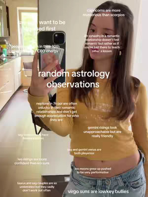 A girl takes a selfie with her phone, with text overlays with astrology observations, the background is a home setting.