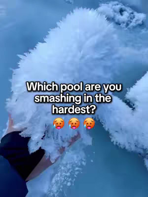 A close-up shot of an expanse of light blue water is seen with a cloud-like structure, likely snow, descending into it from the top. Overlayed on the image is a text box with the question 'Which pool are you smashing in the hardest?' alongside three emojis expressing shock.