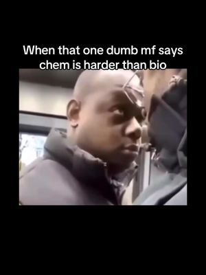 The cover image is a screenshot from what appears to be a video. The main subject is a Black man making a side-eyed, slightly disapproving expression. He is wearing a dark puffer jacket, with a somewhat blurry background showing what looks like a gray interior or wall. The top portion of the image has a white text overlay giving commentary on the subject matter with a black rectangle background.