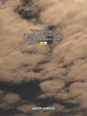 The cover image features a muted, cloudy sky background. In the center, overlaid text poses a question: "abs or biceps?" followed by a playful response, likely referring to someone's attractive features. Below this is an emoji.  The text is in a casual, light font.