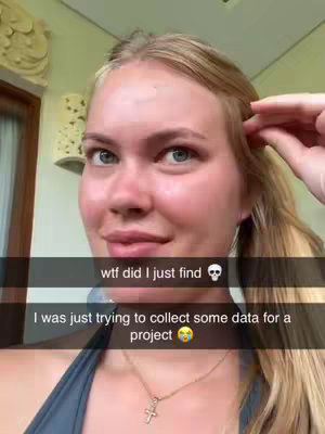 A selfie style shot of a young woman with long blonde hair, her right hand is touching her ponytail. The background is a lightly colored wall with some decorative elements. Two speech bubbles with text are placed on the cover image, and a jewelry piece is visible.