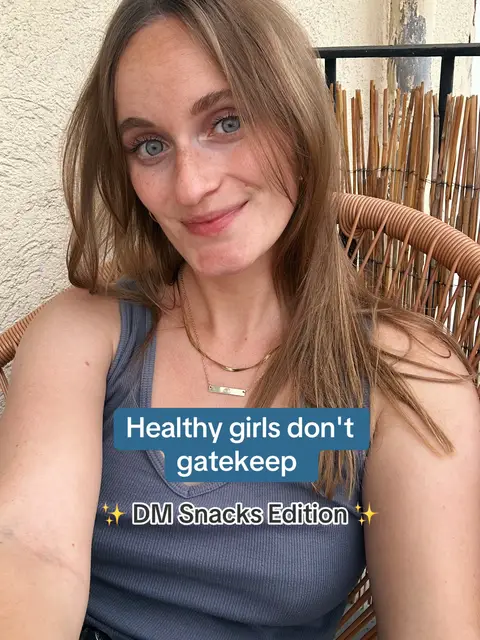 A woman with long blonde hair and blue eyes smiles, seated in a wicker chair. A blue text box overlays her torso. The background appears to be a blurred outdoor scene. The composition is a selfie-style shot, creating a sense of intimacy.