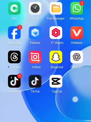 A screenshot of a phone's home screen, with app icons arranged in a grid. A bright blue, swirling gradient serves as the background. There are several app icons, including social media apps (Facebook, TikTok), utilities (clock, file manager), and creative applications (InShot, CapCut), as well as a ChatGPT app.