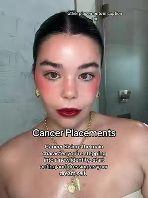 A selfie-style shot focusing on a woman's face, with soft lighting and a blurred background. The woman has dark hair and makeup. Text overlays are positioned at the top and bottom of the frame.