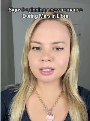 A close-up shot of a woman's face with blonde hair and a necklace, slightly angled. Text overlayed at the top.