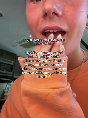 A close-up shot of a person with fair skin, looking towards the camera with their mouth slightly open. Their hands are raised, with fingers near their mouth, and a section of an orange sleeve of a sweater is in view. Text is overlayed in a box on top of the image, describing the usage of an app.