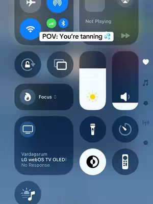 Screenshot of iPhone's control center, displaying various settings and controls. A text overlay reads 'POV: You're tanning'.