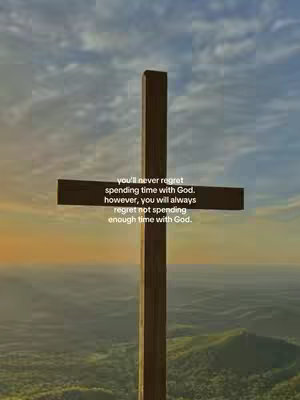 An image featuring a wooden cross, positioned centrally against a backdrop of a sky filled with clouds and the suggestion of a landscape or hills in the distance. The lighting suggests either a sunrise or sunset scenario, with a gradient of colors on the horizon. Text is overlaid on the cross itself, conveying a message about the value of time spent with God, set in a clean, readable font and centered for emphasis.