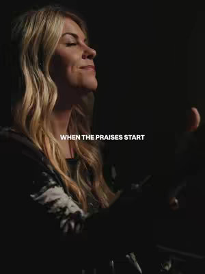 A woman with blonde hair is shown from the side, eyes closed, with text overlayed. The background is dark.
