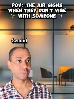 A man with dark hair and a patterned shirt is the central focus, positioned in front of a blurred background of an office setting with glass walls and chairs. The text overlay reads 'POV: THE AIR SIGNS WHEN THEY DON'T VIBE WITH SOMEONE'.