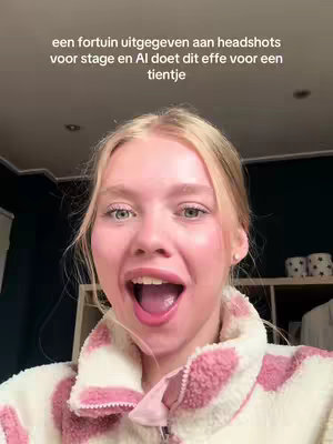 A young woman with blonde hair is shown in the image, her mouth wide open in an expression of surprise or excitement. She is wearing a pink and white patterned fleece jacket. Above her, overlaid text conveys various details, while the background appears to be a room with a dark wall and a shelf. The image's lighting is bright, and the focus is on the woman's face and the text overlay.