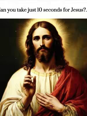 An image of Jesus Christ with a radiant halo, looking directly at the viewer and gesturing with one hand. He is wearing a white robe with gold trim and a red mantle. The background is a soft, golden light.