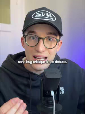 The cover image features a young man in a black cap with 'Von Dutch' branding, round-framed glasses, and a black hoodie. He's looking at the camera with a slightly concerned expression, and a microphone is positioned below him. Text is overlaid on the image.