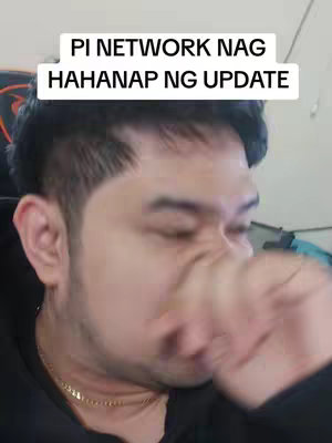 A man is shown in a close-up shot, slightly angled to the side. His face is the main focus, with his right arm appearing from the bottom of the frame, his fist closed and moving towards his face. The image is slightly blurred, creating a sense of motion. Above the man's head is a text overlay on a white background.