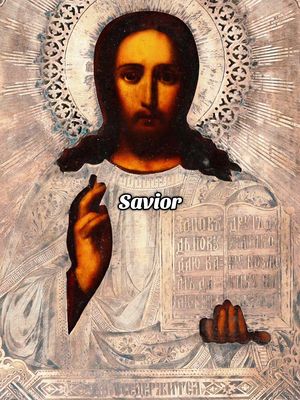 The image features a religious icon depicting Jesus Christ. He is depicted with long brown hair and a beard, wearing a white robe and a halo. He is holding a book in one hand and making a gesture with the other. The background is a gold and bronze color scheme, with decorative elements. The word 'Savior' is overlaid on the image.