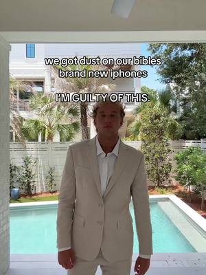 A man in a tan suit stands in front of a pool with a white house and palm trees in the background. Text overlays the image.