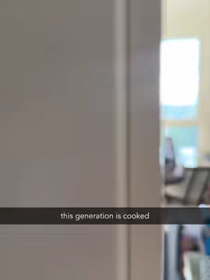 The image shows a neutral doorway with a portion of a room visible through it; a horizontal black bar with white text that says 'this generation is cooked' is overlaid across the image.