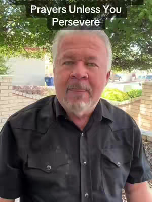 A middle-aged man with gray hair and a beard is the central focus. He wears a black button-down shirt. The top of the image has the text overlay in a black box.