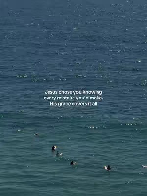 An aerial view of a vast, rippled body of water with a few surfers dispersed unevenly. Overlaying the water is white text set in a sans-serif font, centered near the bottom half of the image.