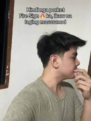 A young man is seen in profile against a light-colored background. He is wearing a light-colored t-shirt and has short, dark hair. Text overlayed on the image states, "Hindi nga porket Fire Sign ka, ikaw na laging masusunod," with a fire emoji.