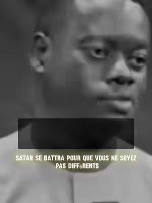 A grayscale image features a close-up of a man's face with a bald head. The man has dark eyes and is looking slightly off-camera. The image is well-lit, with the focus on his facial features. A dark rectangular overlay with white text provides the video's hook.