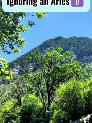 View of a mountain range with trees and a river, a hook text overlaid on the top.