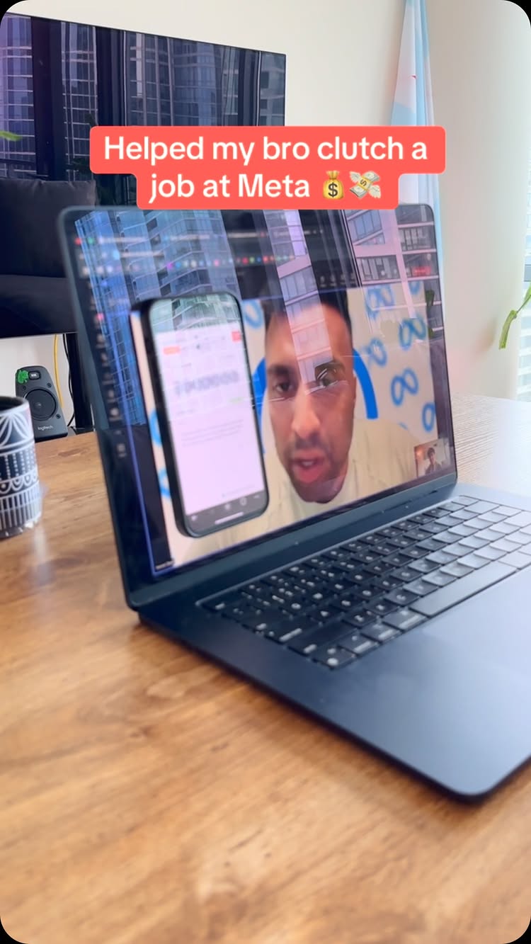 A person is featured in a video call on a laptop. A phone is also displayed showing the same person and content as the video call. The overlay text is in a red text box. The scene takes place in a well-lit room with a wooden desk and a view of a city through a window.