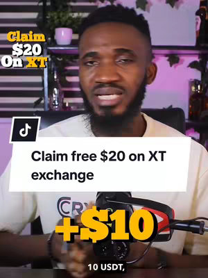 Medium shot of a Black man with a beard, wearing a cream-colored shirt, set against a blurred indoor background. The man is centered with text overlays offering a crypto promotion, plus a TikTok logo in the upper-left. Graphics include yellow text saying '$10' in a circle.