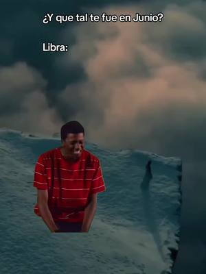 The image features a man with dark skin, wearing a red and white striped shirt, positioned in front of a snowy, mountainous landscape. The visual composition includes text overlays.