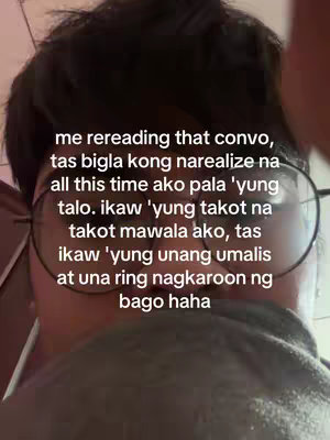 A selfie-style shot with the creator's face filling most of the frame. They appear to be wearing eyeglasses with a dark background. Text overlayed on the image reads "me rereading that convo..."