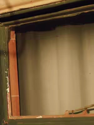An interior shot of what appears to be the inside of a vehicle, framing an open space.