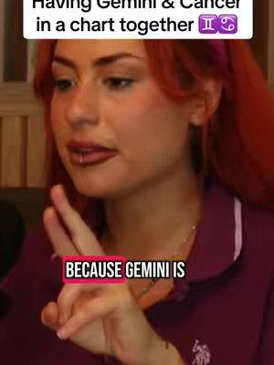 The cover image features a woman with auburn hair in a close-up shot. She is wearing a dark purple polo shirt. The background appears to be indoors. Text overlays are present near the top and at the bottom of the screen, and she is making a hand gesture with a few fingers.
