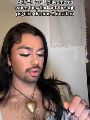 A close-up shot of a person with a mustache looking at the camera, with text overlayed at the top.