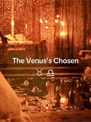 An indoor scene with a warmly lit, blurred background focusing on the words 'The Venus's Chosen' and two zodiac symbols. The scene has a gold-toned color palette with multiple light sources giving off a blurred and warm lighting. A hand can be seen in the lower left corner.