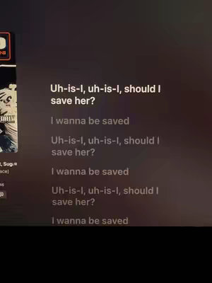 The image displays song lyrics on a screen, likely from a music streaming app. The lyrics are center-aligned and in a white font, against a dark, possibly black, background. In the upper left corner, there's a glimpse of what appears to be a music album cover. The screen is slightly angled, giving the impression of a phone or computer display.