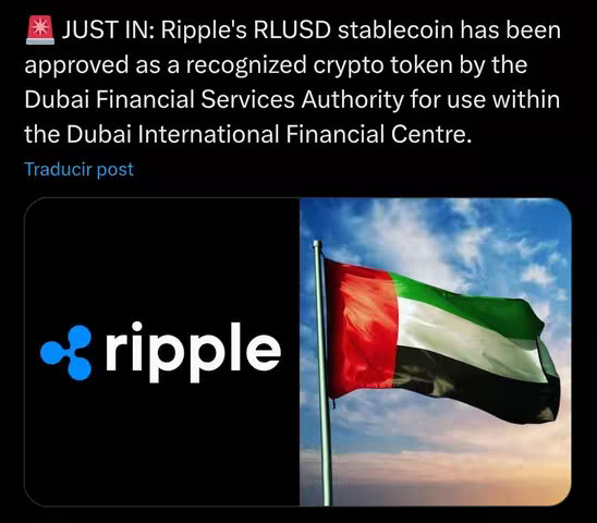 The image is split into two main sections. On the left, a black background features a stylized logo of 'ripple' in white text with a blue and white symbol, and on the right, is a flag of the United Arab Emirates blowing in the wind. Above these is text overlayed with the phrase 'JUST IN' and a description.