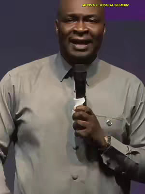 A man in a gray long-sleeved shirt with a black tie is holding a black microphone, speaking. The image has a purple background. The text overlay reads "APOSTLE JOSHUA SELMAN".