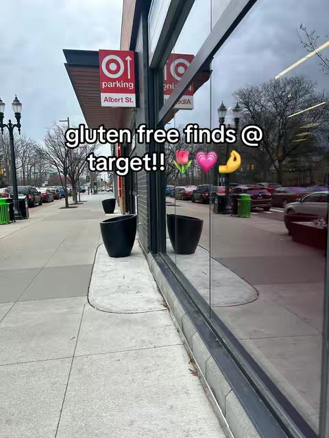 A street scene outside a Target store, with the building reflected in a large glass window. The sidewalk, a parking sign, and cars in the background are also visible. Text overlayed adds the hook.