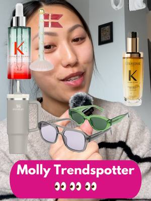 The cover image features a woman holding various items: glasses, hair products, and a drink container. Text overlays include a pink banner at the bottom saying "Molly Trendspotter" and "Hvilket item ønsker du dig mest?" which translates to "Which item do you want the most?" The overall composition suggests a product suggestion or wish list theme, with the woman smiling and engaging the viewer.