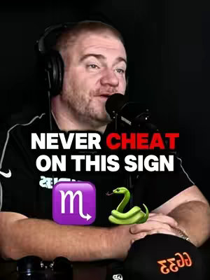 A man with a microphone is in front of a dark background. Overlaid on his face is text that reads, 'NEVER CHEAT ON THIS SIGN'. To the lower-left of the text is a purple box containing the astrological symbol for Scorpio. To the right is an emoji of green snake.