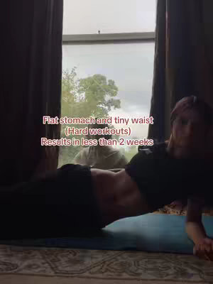 The cover image shows a woman lying on a blue mat, wearing a black top and bottoms, with her core muscles flexing. She is positioned near a window with curtains, and the text overlay on the image advertises fitness results.