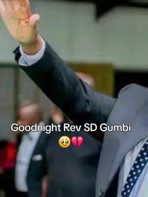 The cover image shows a close-up of a person's arm wearing a black suit, with the hand raised. Below, text overlays read 'Goodnight Rev SD GUMBI', accompanied by emojis of a sad face and a broken heart. The background hints at a public gathering or event. The color scheme is muted, with a focus on dark tones and skin tones.