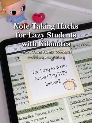 The cover image shows a tablet displaying notes, with a sticker note overlay. A small toy and a heart-shaped object are present on the top left. The text "Note-Taking Hacks for Lazy Students" is visible at the top, with additional text and a small graphic on the sticker note.