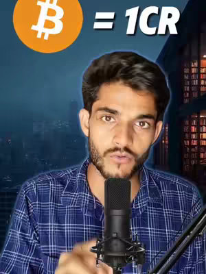 The image features a man speaking into a microphone against a backdrop of a blurred cityscape and architectural element. Above his head, the Bitcoin logo, an orange circle with a white 'B', is displayed next to the text '= 1CR'. The man is wearing a checkered blue shirt and has a concentrated expression.