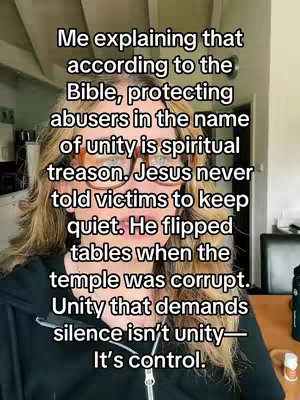 A woman with long blonde hair and glasses is centered in the frame, with overlaid white text against a blurred background. She is wearing a black top. The text discusses the concept of unity and spiritual abuse.