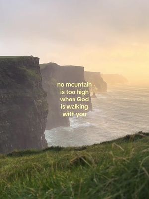A scenic view of cliffs and ocean under a cloudy sky. Text overlayed with a motivational quote.