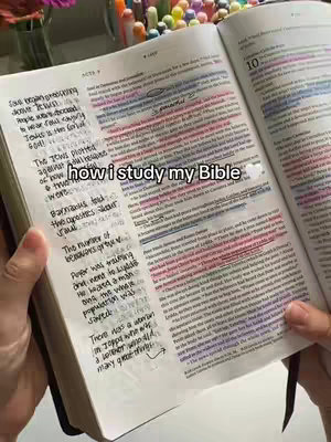 An open Bible sits on a table with pages marked with colorful highlighters and writing. The image is well-lit, with the focus on the text and annotations. The hook text sits above the writing on the bible pages. The overall composition shows a study setup.