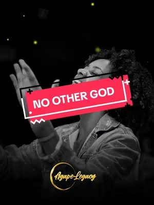 The image is a black and white shot with the primary focus on a person's upper body, likely a woman. She has dark, curly hair and is positioned with her head tilted upwards, eyes closed, and arms raised in a gesture of worship or praise. A red rectangular banner with the words 'NO OTHER GOD' in white, chunky font is overlaid across the central area of the image. A gold-toned, stylized logo with the words 'Agape-Legacy' in a cursive font is at the bottom of the image. The overall lighting is dark with a few small, glowing particles scattered across the background.