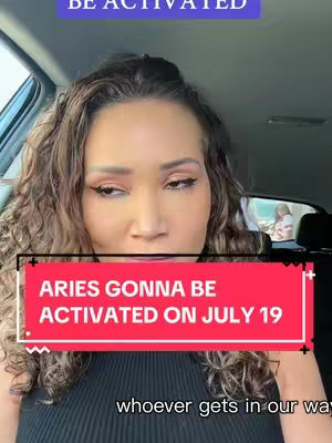 The image shows a woman inside a car, angled towards the camera. A red rectangular overlay with white text appears on the lower portion. Above the red rectangle, is a rectangular purple banner that reads "BE ACTIVATED". The woman is wearing a black shirt and the background indicates a street setting.